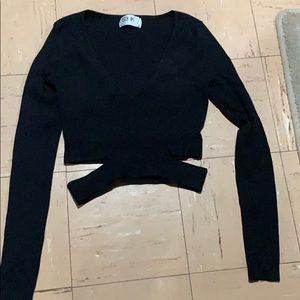 Seek black top with cut out on waist